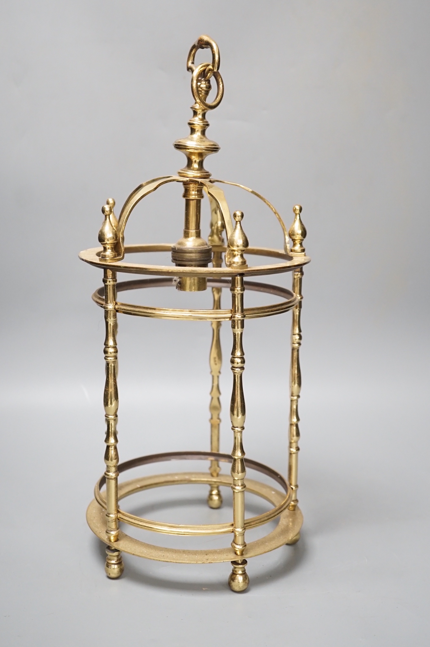 A brass ceiling lantern, lacking glass, 41cm high